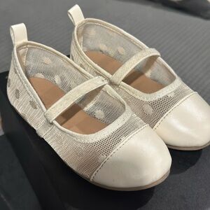 Cream and white ballet flats